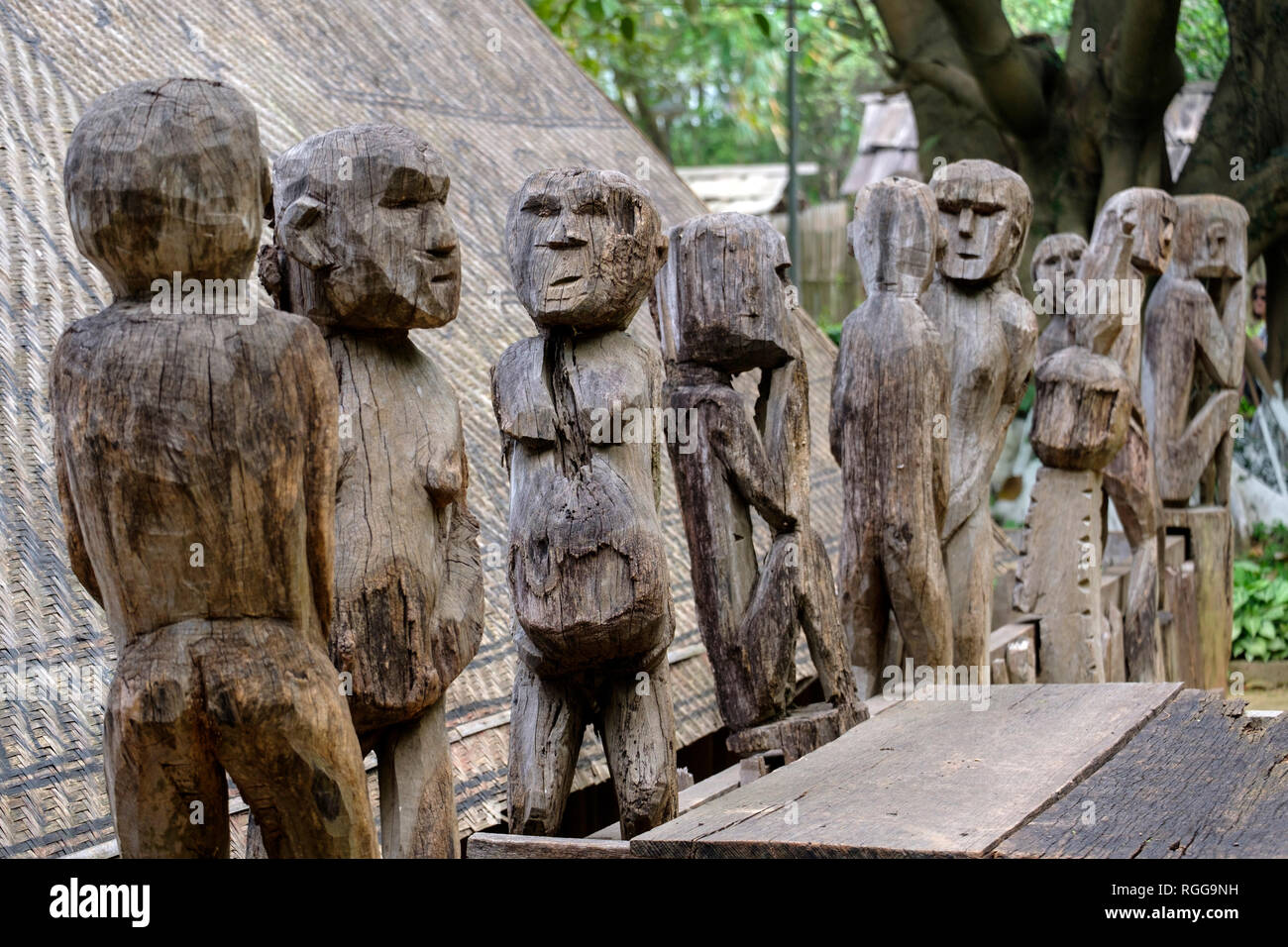 Wooden statues outside a Giarai tomb the Vietnam Museum of Ethnology