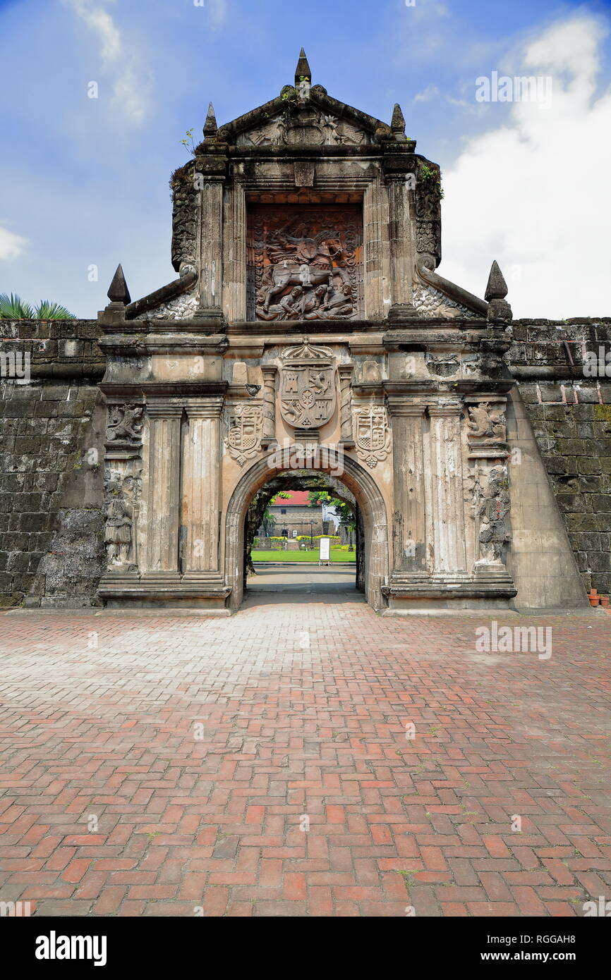 The main gate of Fort Santiago pierced in the south front of the curtain wall of the citadel with wooden relief sculpture of Santiago-Saint James abov Stock Photo