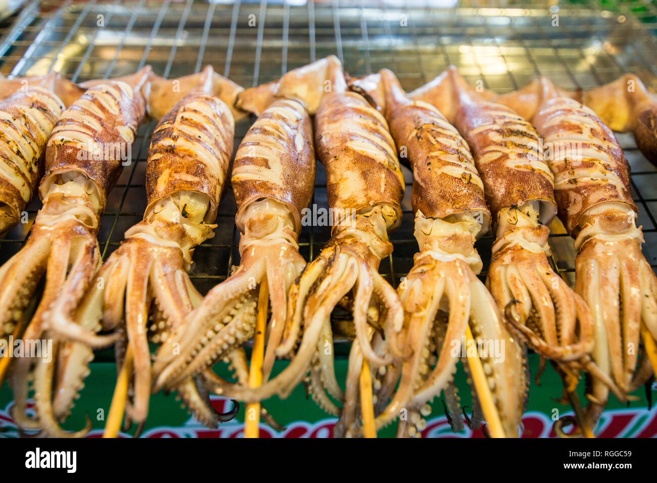 grill squid at the seafood and fish market at the Naklua Fish Market in