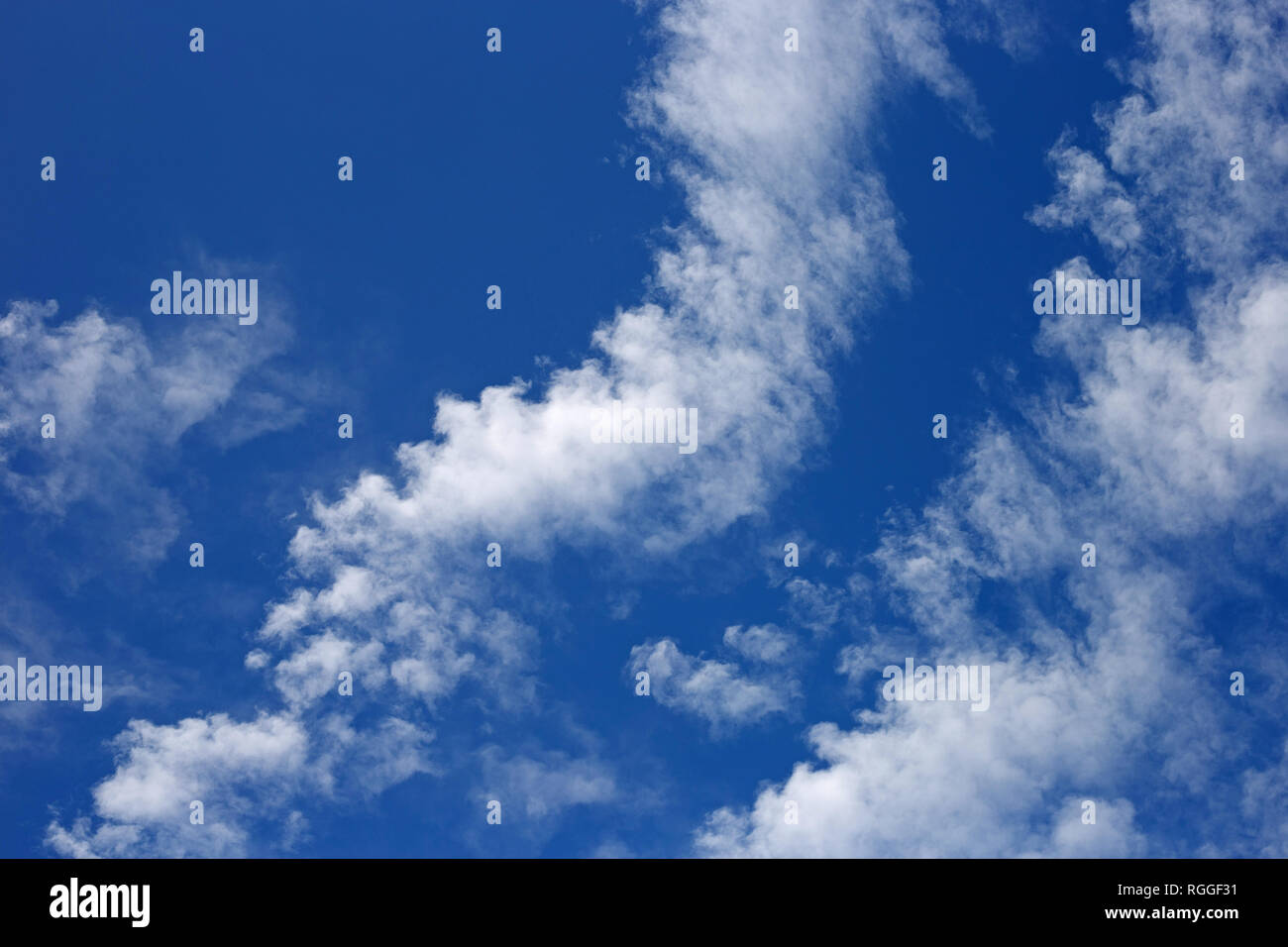 Blue sky background with cloud. Copy space Stock Photo - Alamy