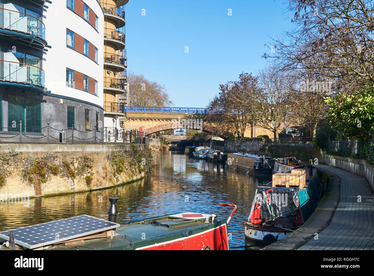 Limehouse Cut, Limehouse, East London UK, with houseboats and new