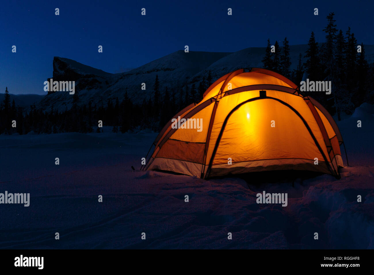 Camping In Winter Season At Night Lantern Shining In The Tent Mount Skerfe And Sarek National Park In Background Jokkmokk County Sarek National Pa Stock Photo Alamy