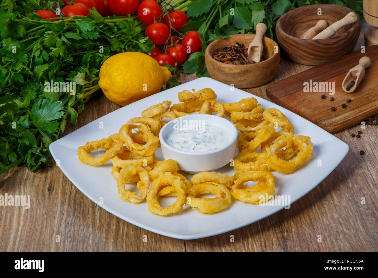 Pile deep fried battered onion rings hi-res stock photography and ...