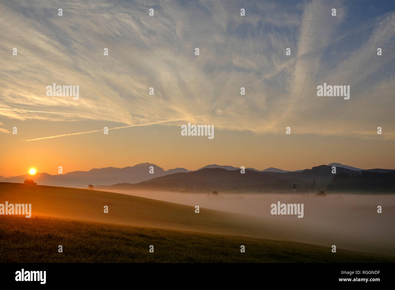 Germany, Pfaffenwinkel, view of landscape at sunrise Stock Photo