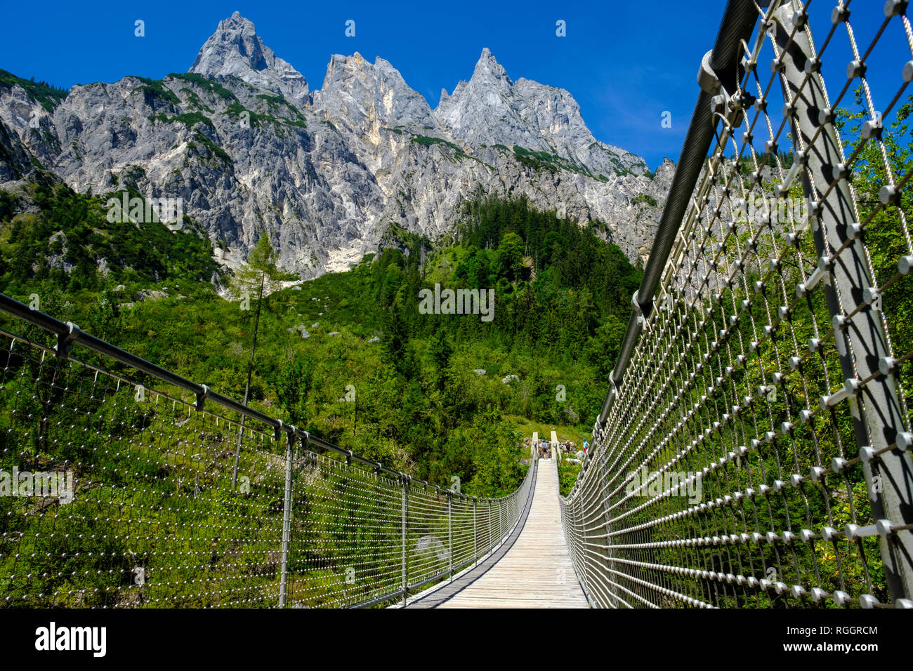 Germany, Bavaria, Berchtesgadener Land, Berchtesgaden Alps, Klausbach Valley, Muehlstuetzhoerner, suspension bridge Stock Photo