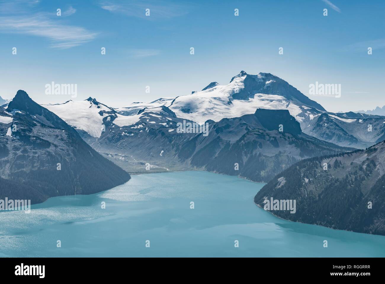 Turquoise Glacial Lake Garibaldi Lake in front of mountain range with