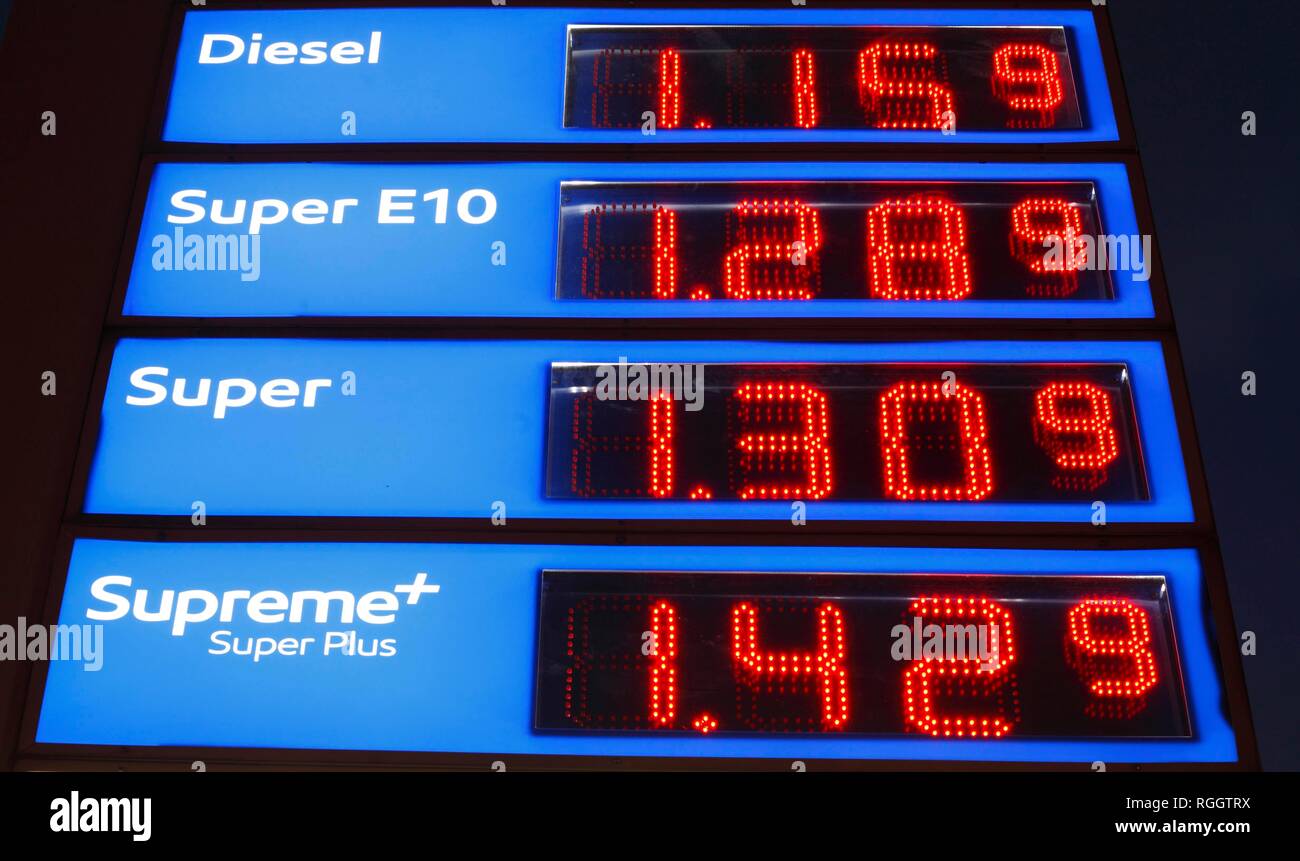 Illuminated Blue Electronic Price Board at a Petrol Station, Germany Stock Photo