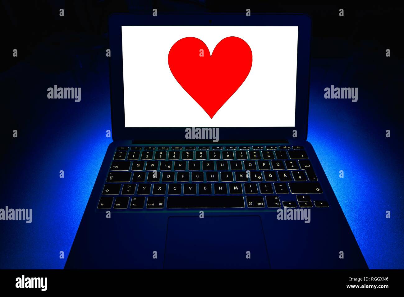 Symbol picture partnership agency, dating agency, red heart on screen of a notebook, Baden-Württemberg, Germany Stock Photo