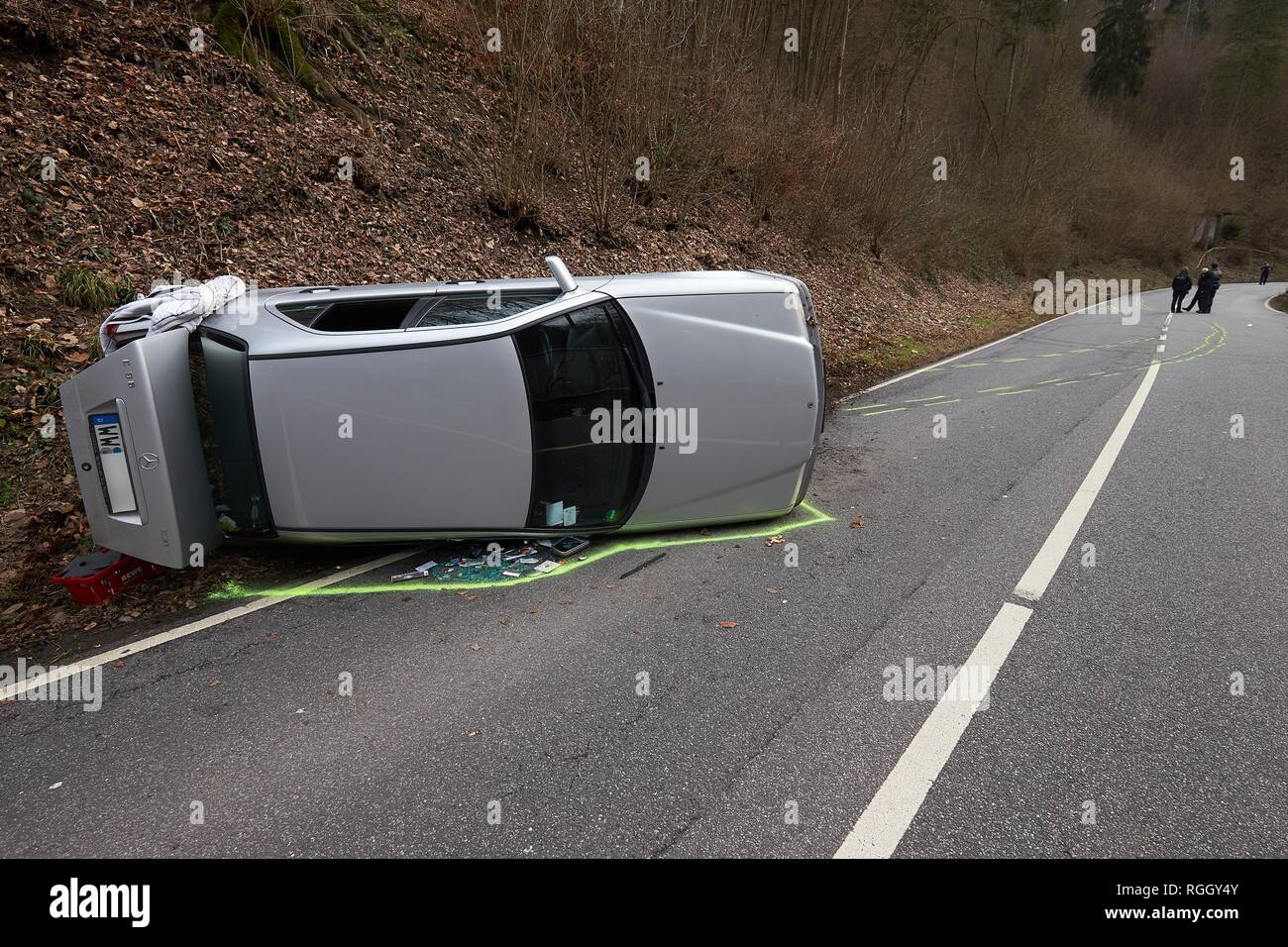 A car overturned in an accident on the L307 Vallendar between Vallendar and Höhr-Grenzhausen. Four people were injured Stock Photo