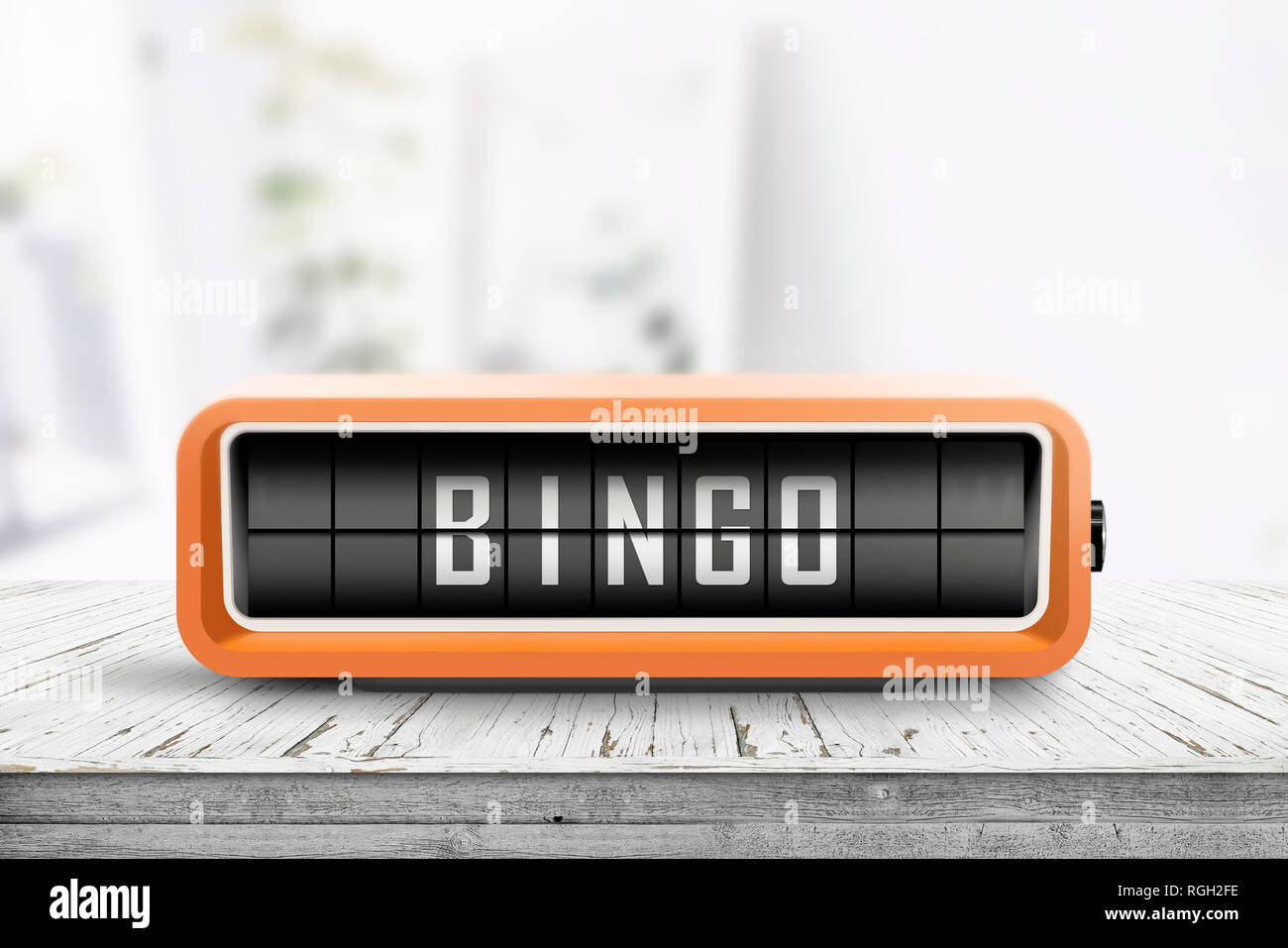 Bingo message on a retro alarm device in a bright living room with daylight Stock Photo