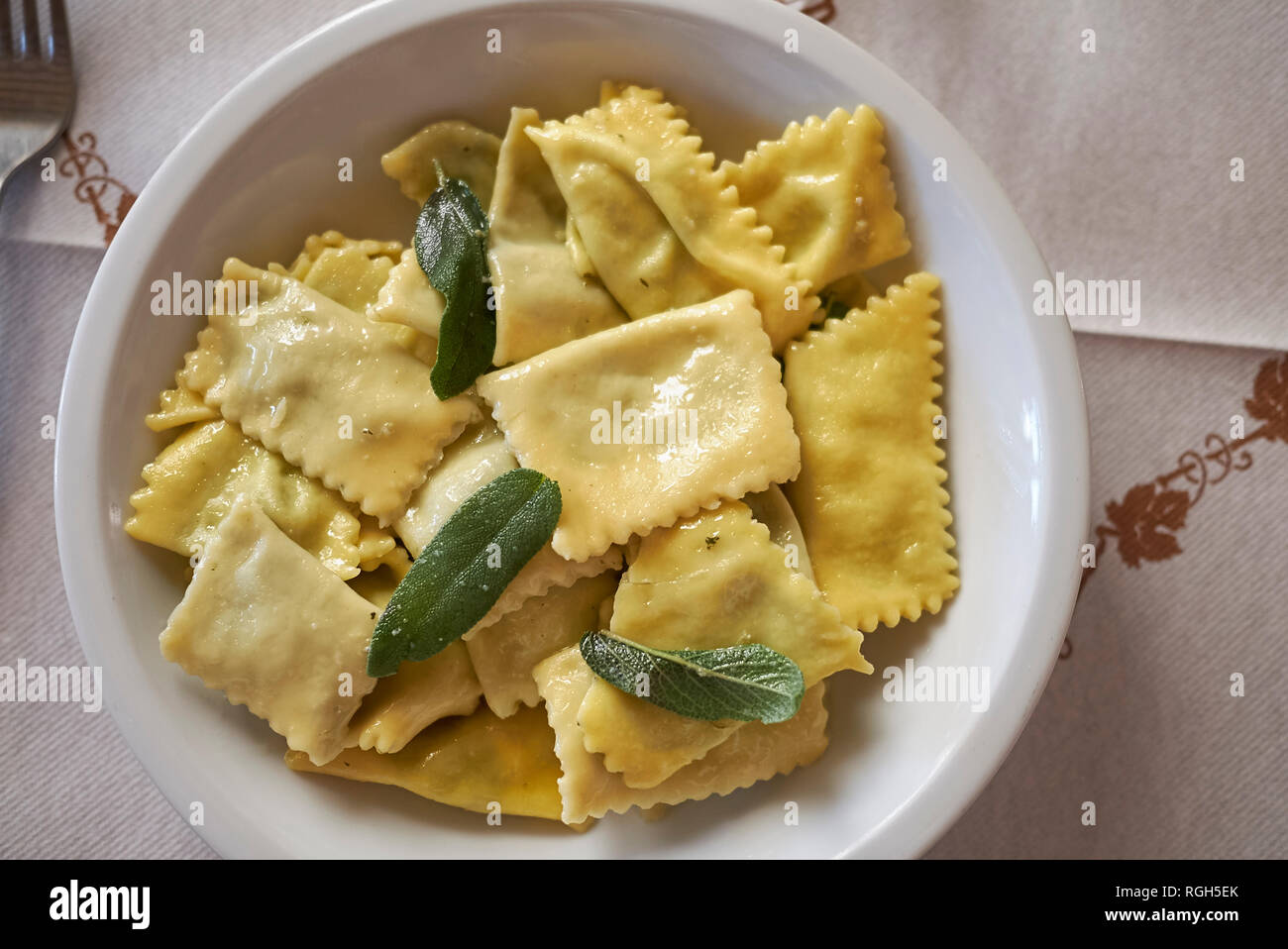 Ravioli pasta with butter and sage Stock Photo