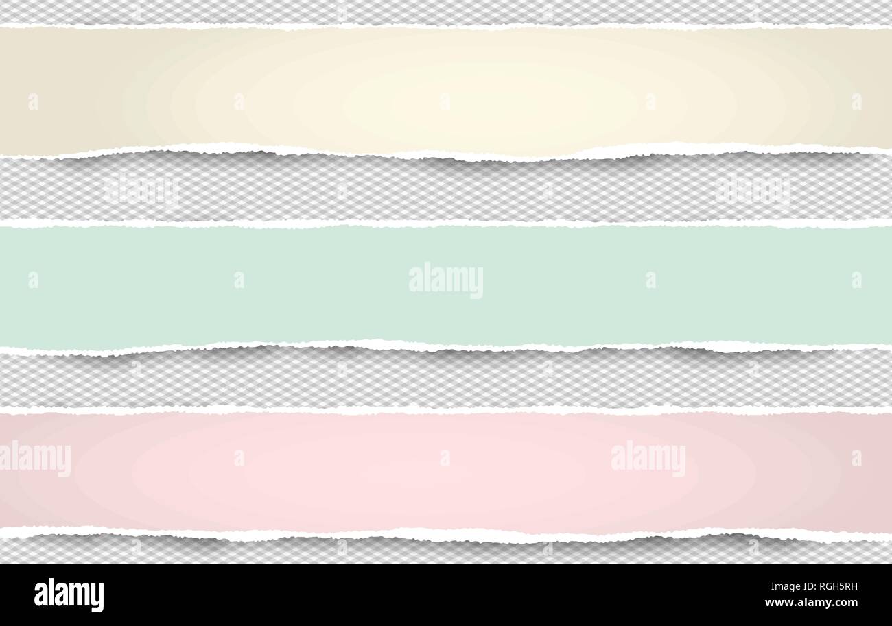 Ripped yellow, green pink paper strips for text or message are on grey ...