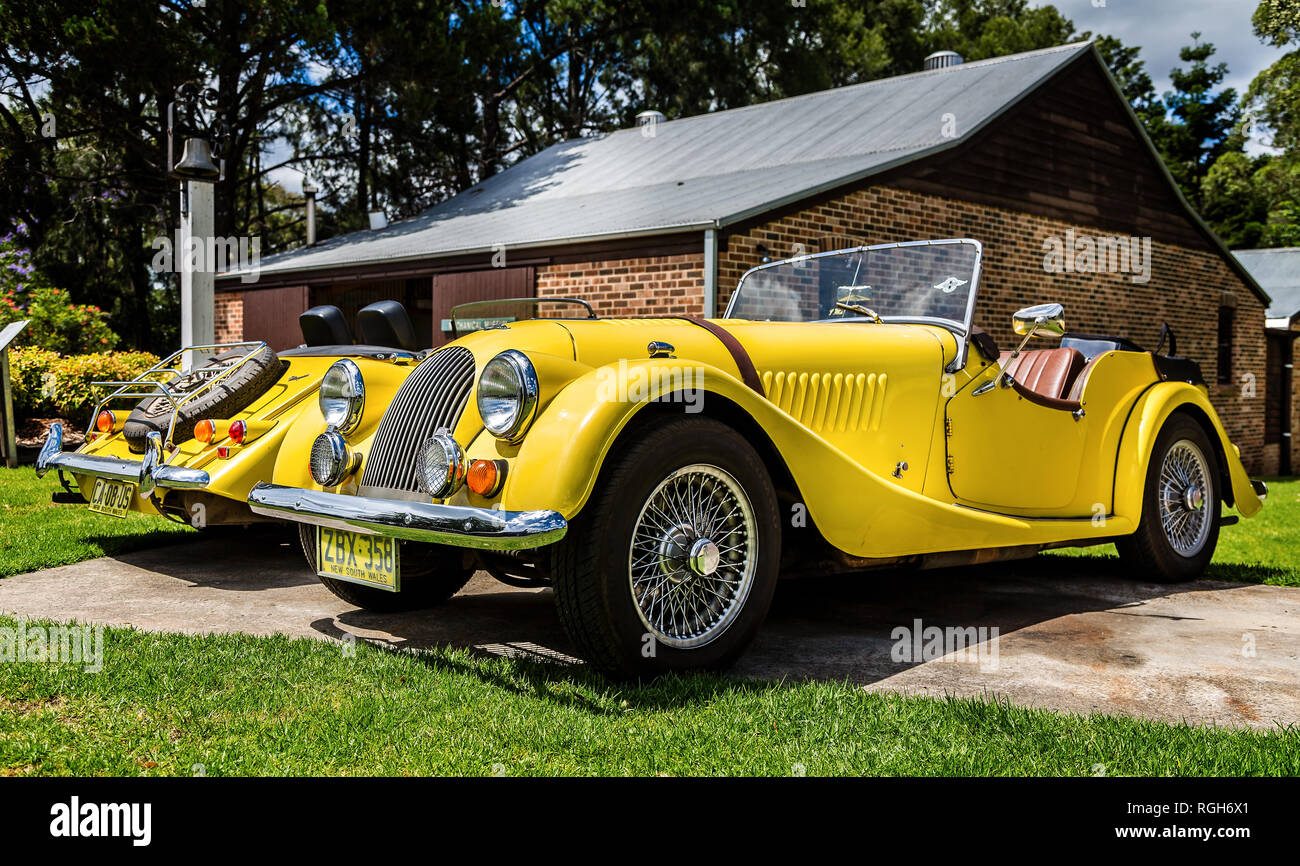 Pair of Classic yellow Morgan Sports Car in Fagan Park, NSW, Australia on 6 December 2014 Stock Photo
