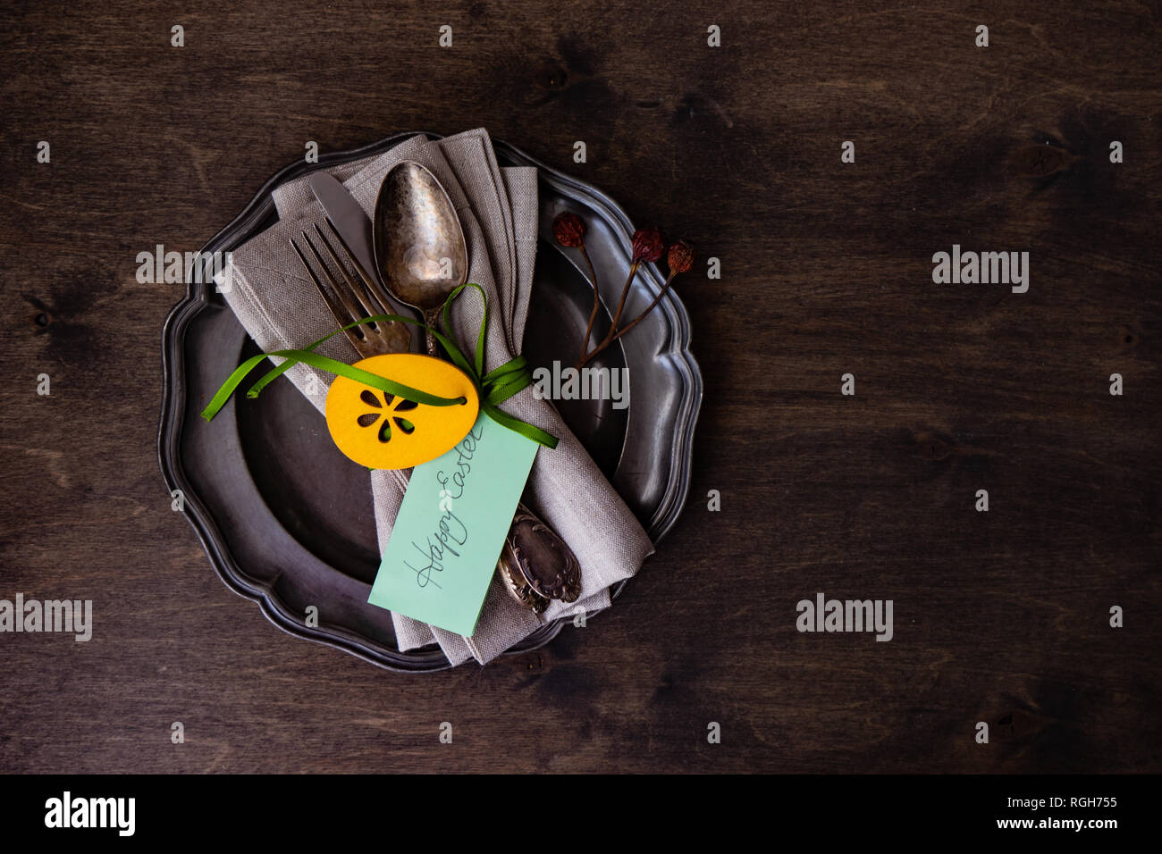 Festive easter table setting with colored eggs and easter bunny concept with copyspace Stock Photo