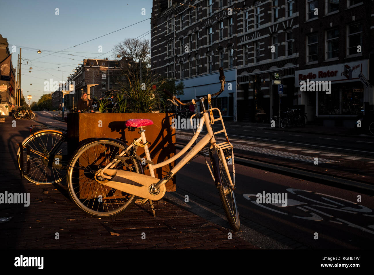 Amsterdam, Netherlands 29 October 2016 Parked white bicycle in