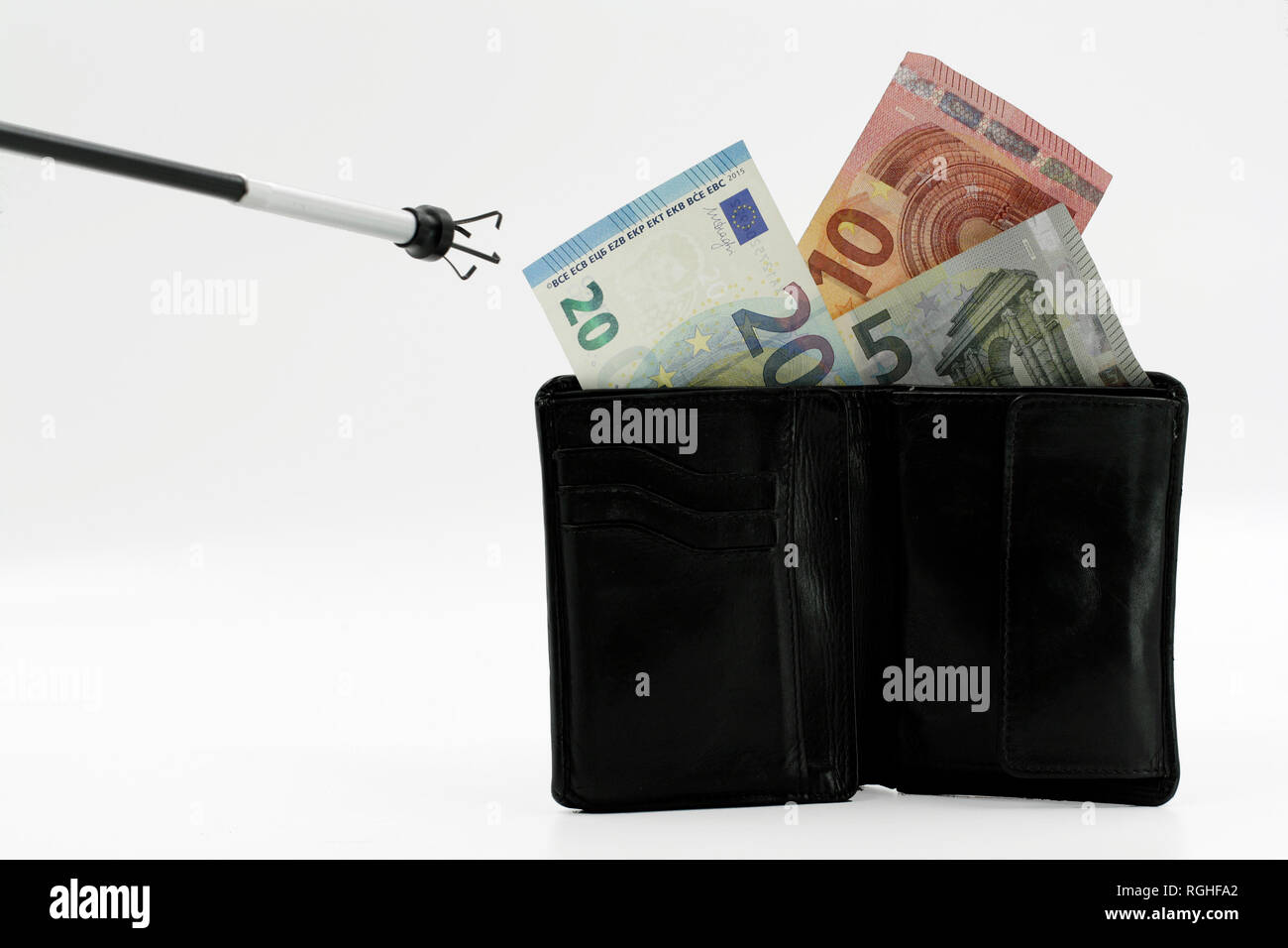 purse and euro banknotes with moneygrabber isolated on white background Stock Photo