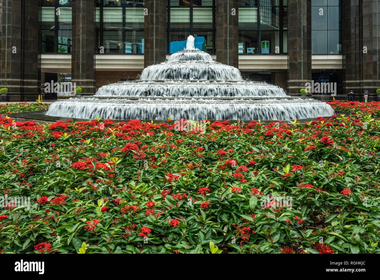 A decorative water fountain outside the Central Plaza building in Hong Kong, China, Asia Stock
