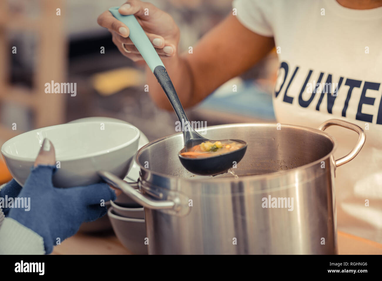 Close up of a ladle being in use Stock Photo