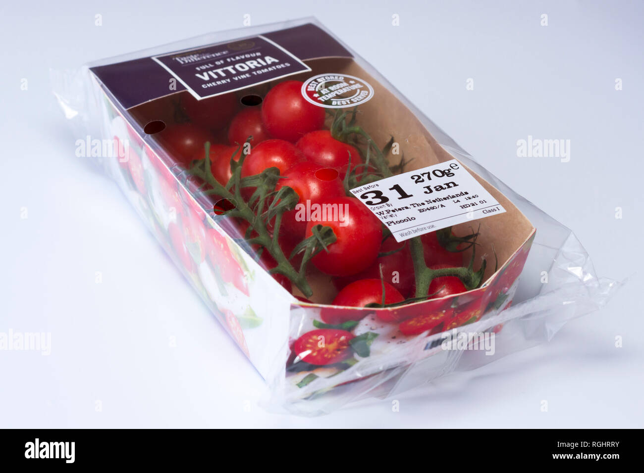 Vittoria cherry vine tomatoes in packaging. Grown in the EU. 2019 Stock Photo