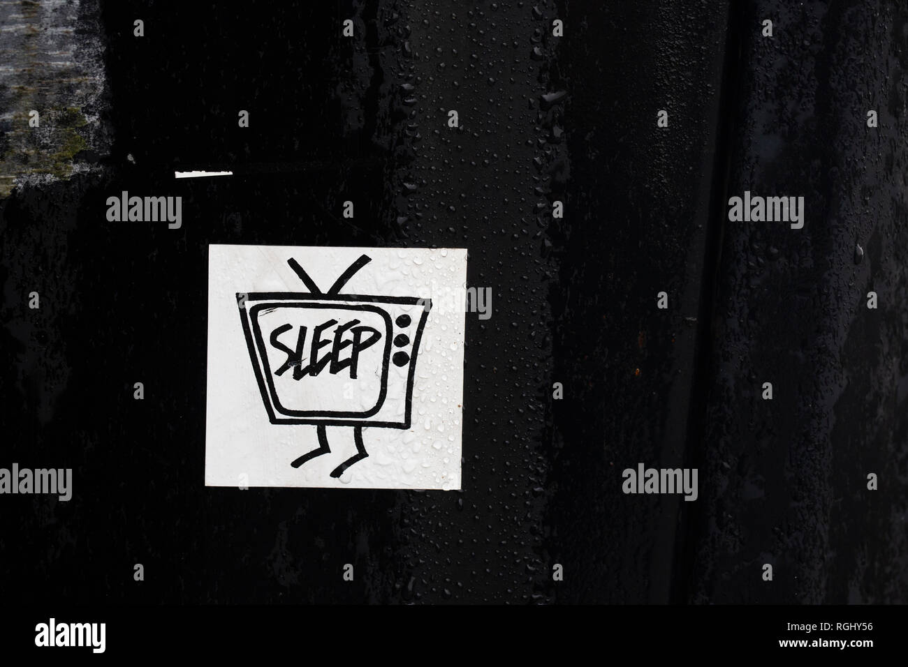 A sticker with the word sleep inside a television set Stock Photo