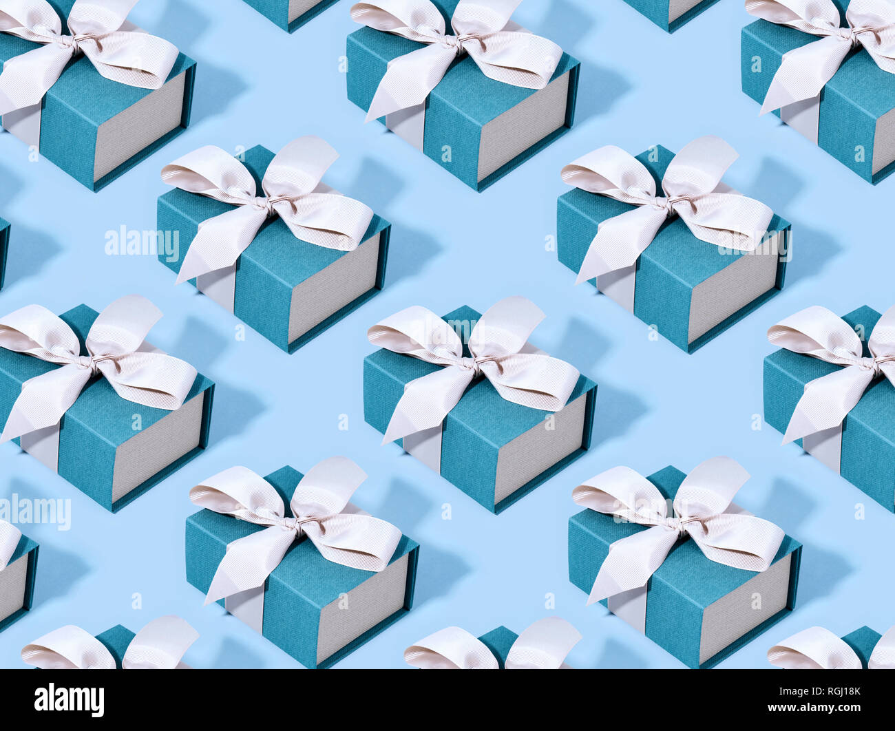 Pattern made of blue gift boxes. Stock Photo