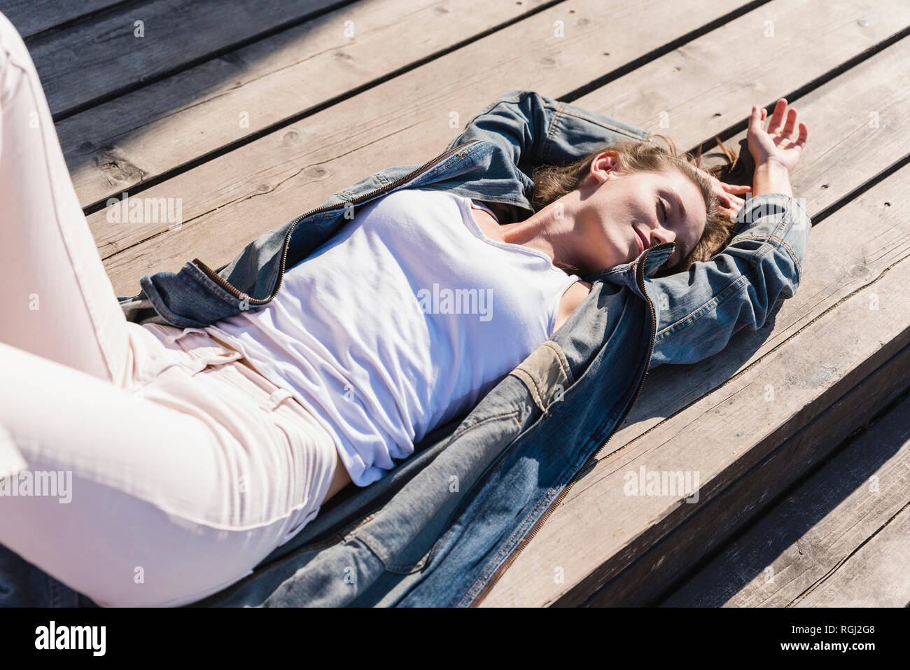 Woman relaxed in sunshine hi-res stock photography and images - Alamy