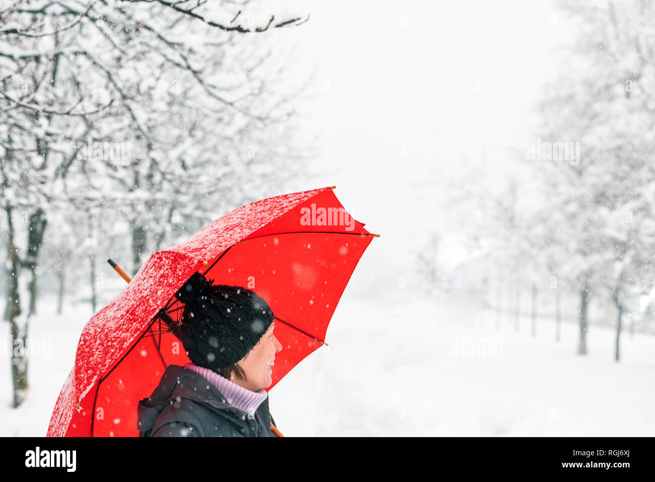 Red umbrella winter snow hires stock photography and images Alamy