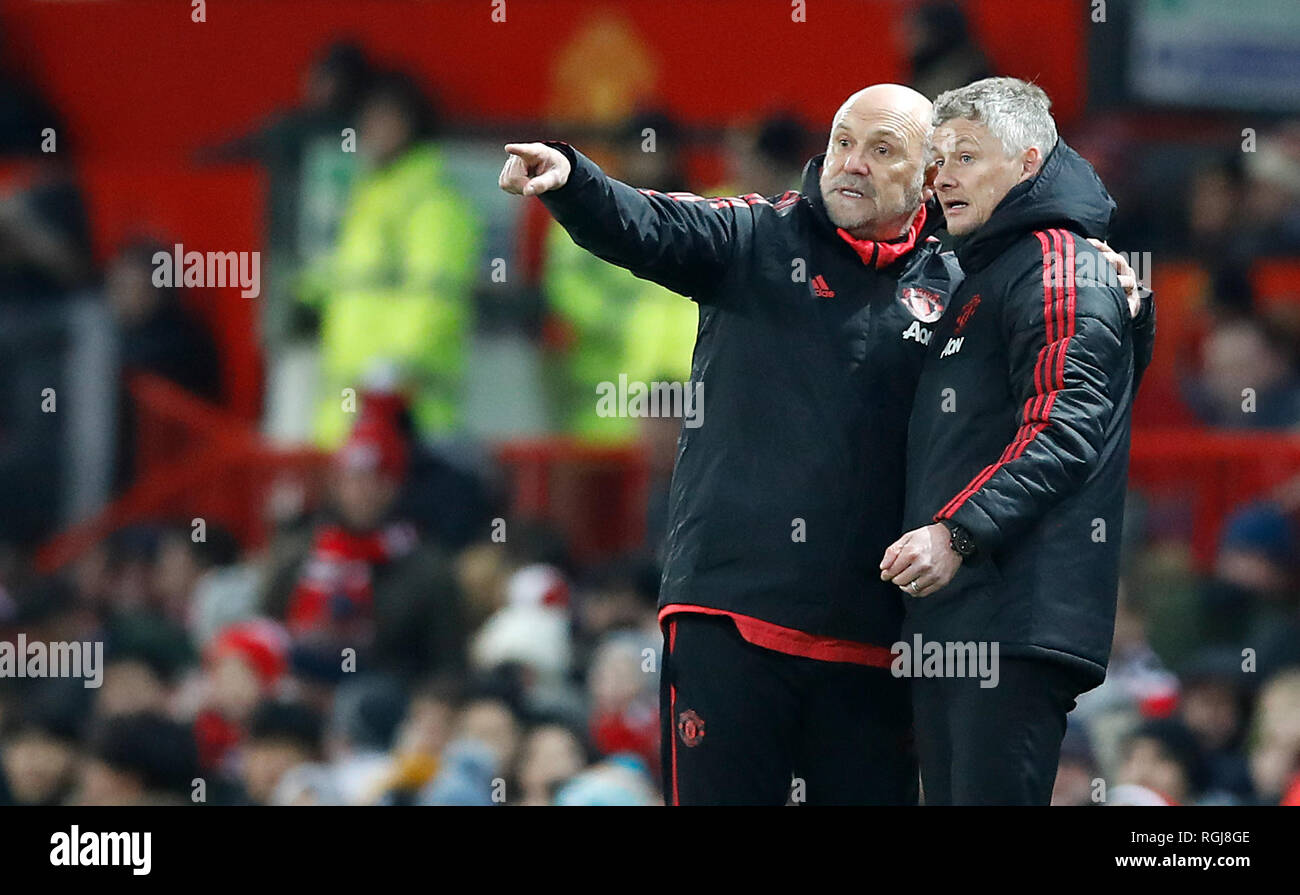 Manchester United Coach Mike Phelan And Interim Manager Ole Gunnar Solskjaer Gestures On The Touchline During The Premier League Match At Old Trafford Manchester Stock Photo Alamy