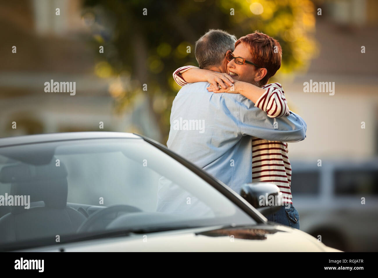 Happy middle aged couple hugging. Stock Photo