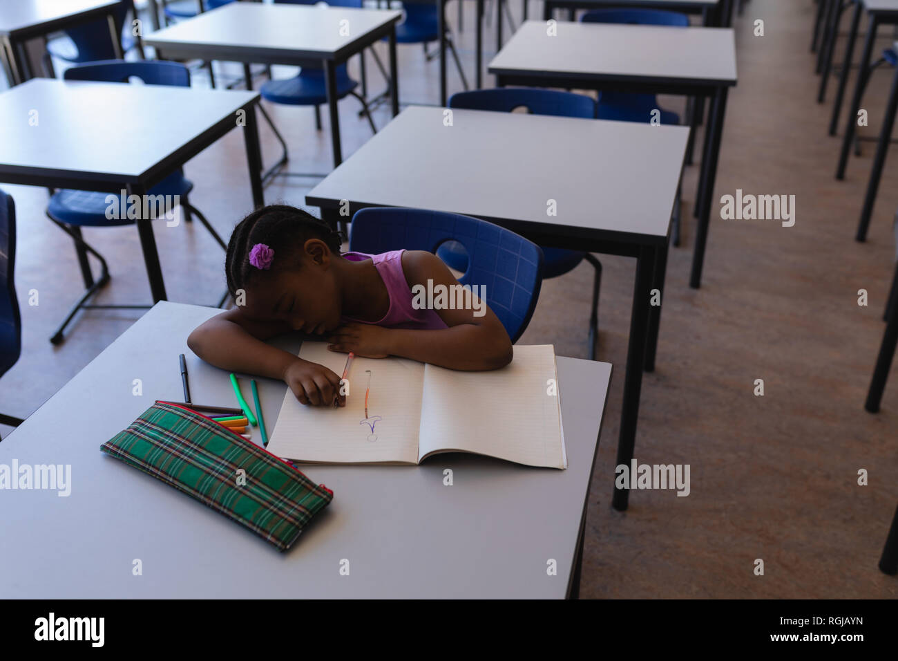 School girl sleeping in classroom hires stock photography and images