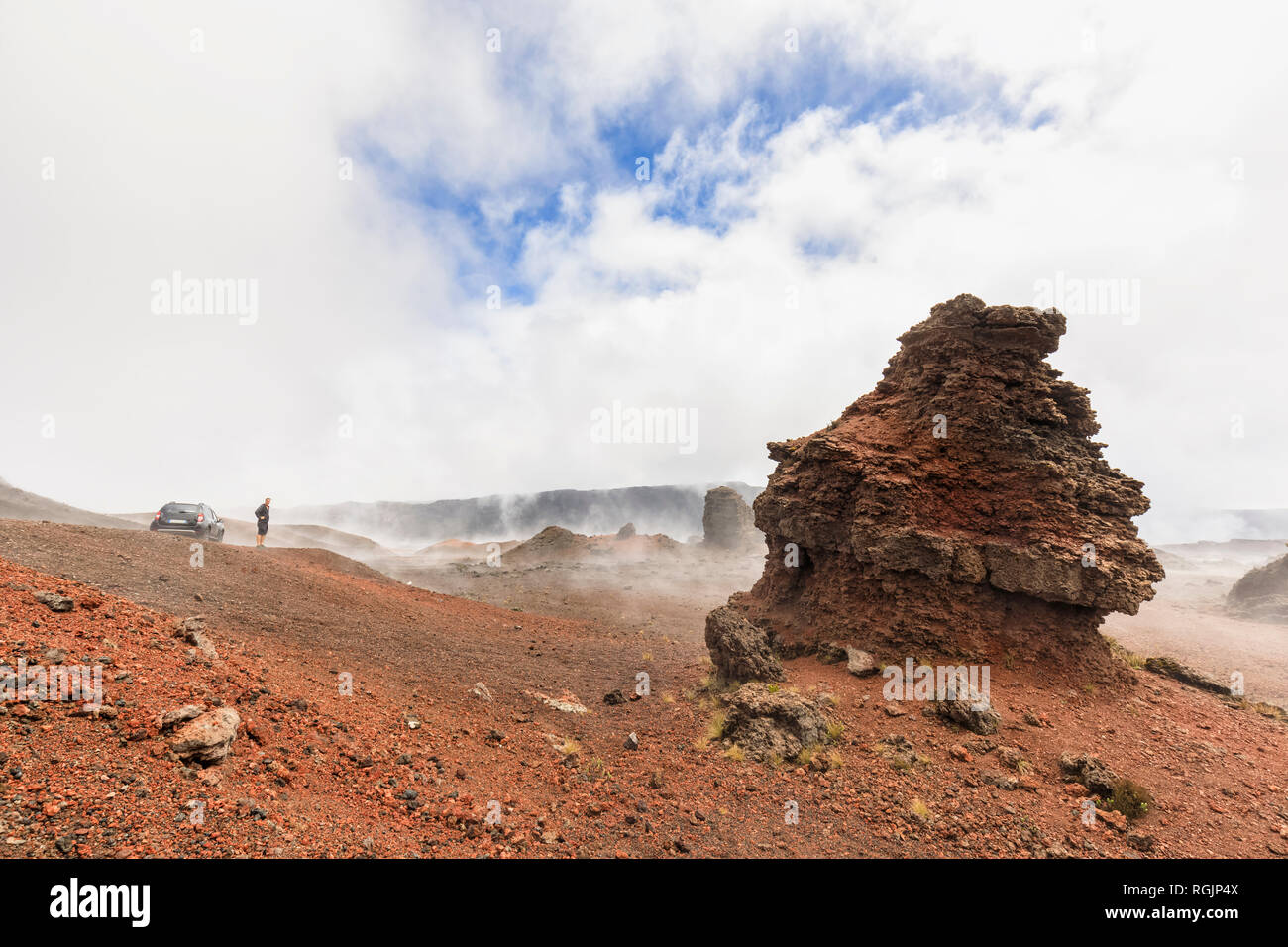 Reunion, Reunion National Park, Piton de la Fournaise, Route du volcan, Tourist in the Plaine des Sables Stock Photo