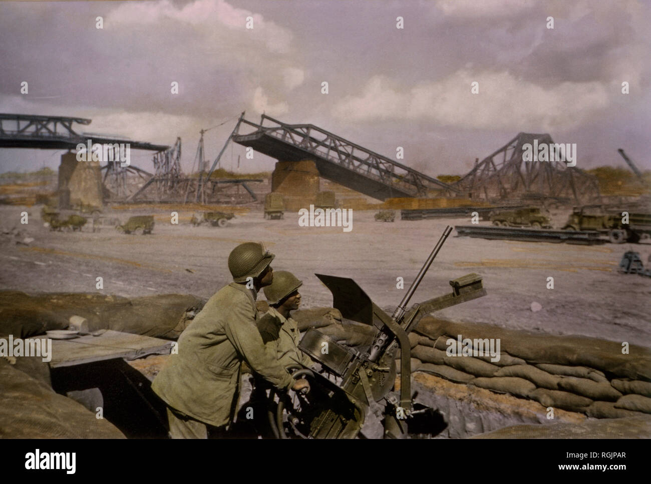 Enlisted Men at .50-caliber Browning Machine Gun HB M2, Alert for Enemy Aircraft, Central Europe Campaign, Western Allied Invasion of Germany, 1945 Stock Photo