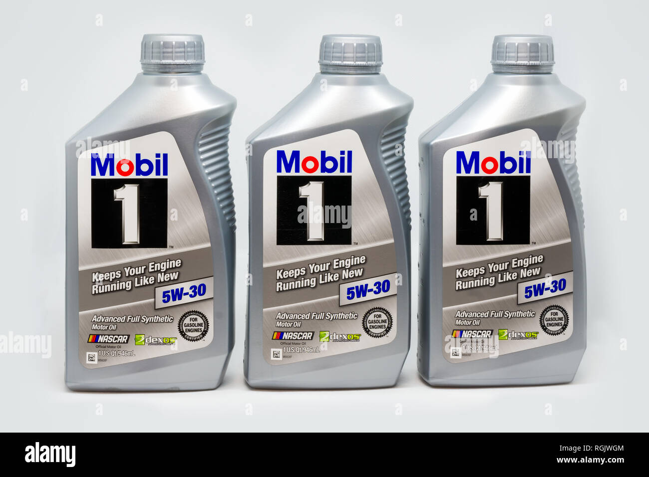 ST. PAUL, MN/USA - JANUARY 27, 2019: Mobil 1 Motor oil in grouping of three. Mobil 1 is a brand of synthetic motor oil and other automotive lubricatio Stock Photo