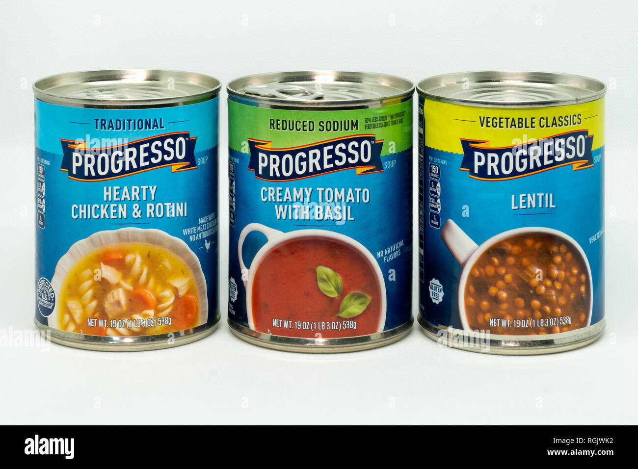 ST. PAUL, MN/USA - JANUARY 27, 2019: Progresso tomato, chicken, and lentil soup cans in grouping of three. Stock Photo