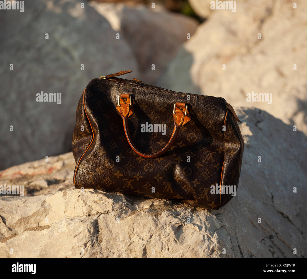 Louis vuitton bag woman hi-res stock photography and images - Alamy