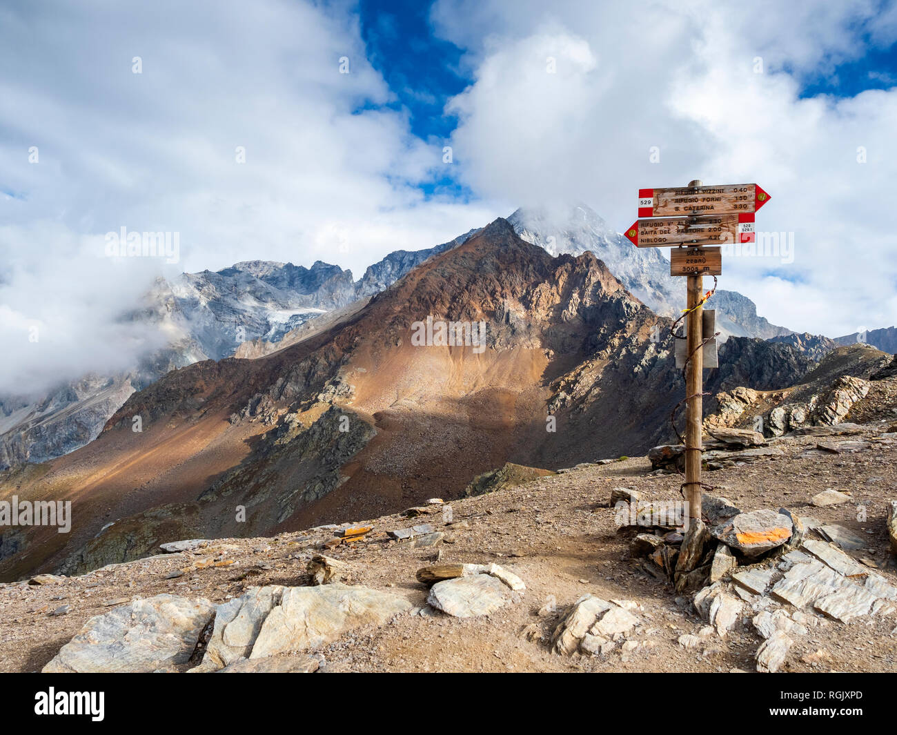 Italy, Ortler Alps, sign post, Gran Zebru in the background Stock Photo
