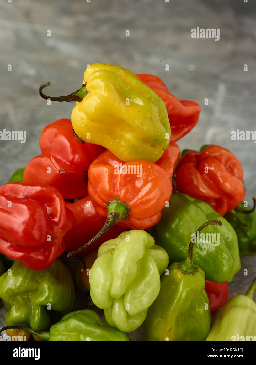 Scotch Bonnet peppers food still-life photograph Stock Photo - Alamy