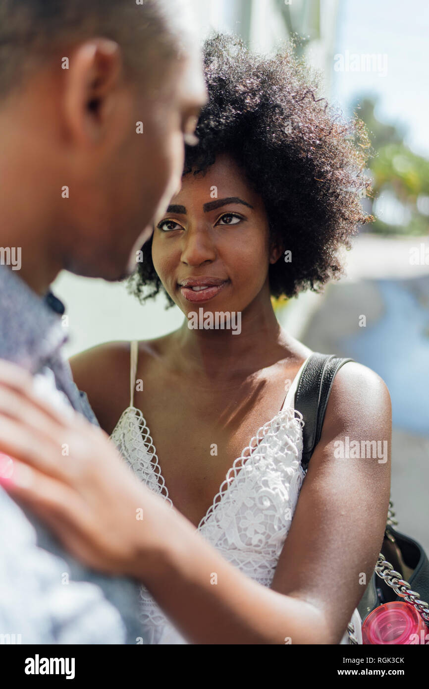 Affectionate young couple facing each other Stock Photo