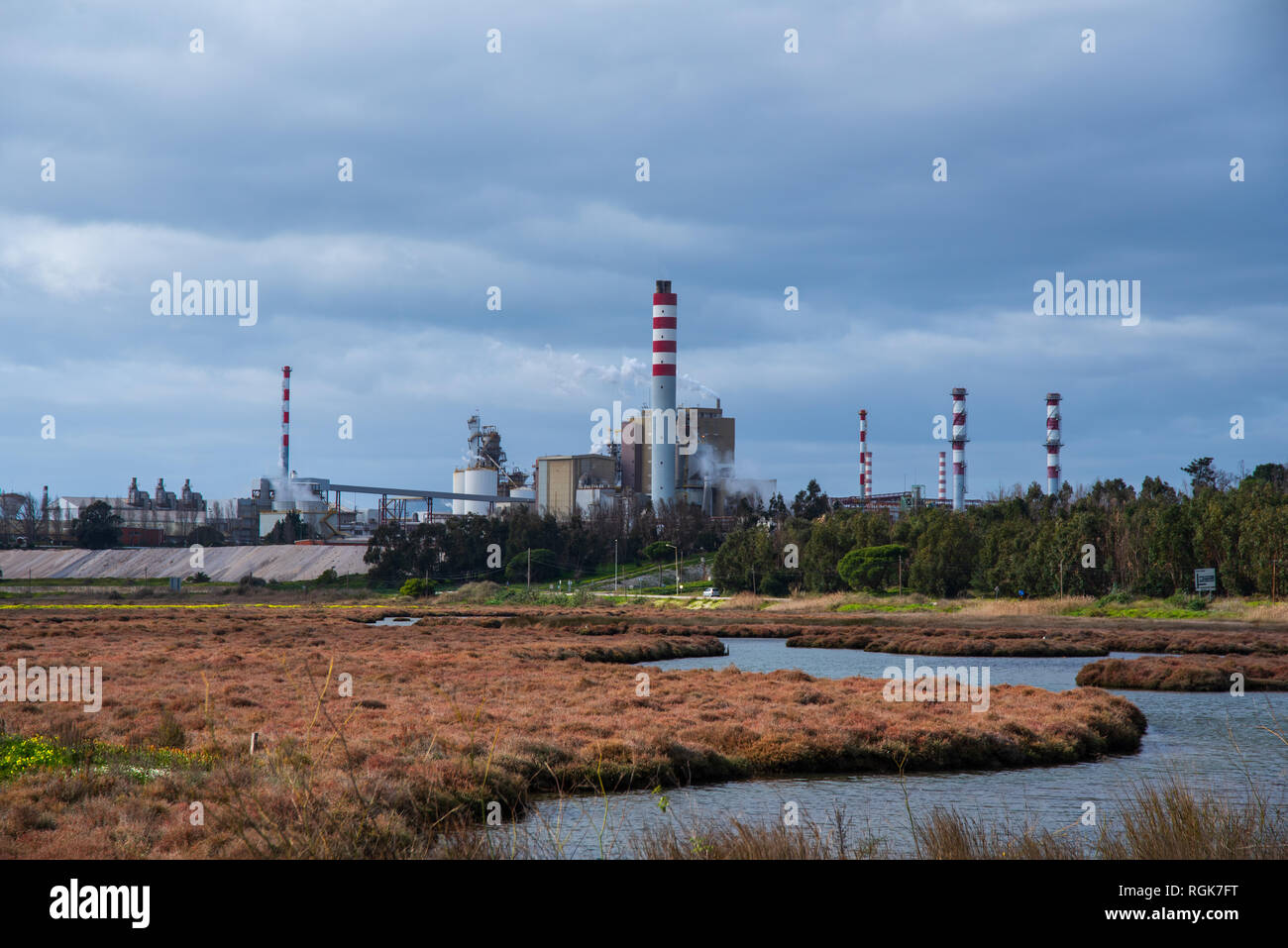 the end of the sado estuary in Setubal with factorys behind Stock Photo