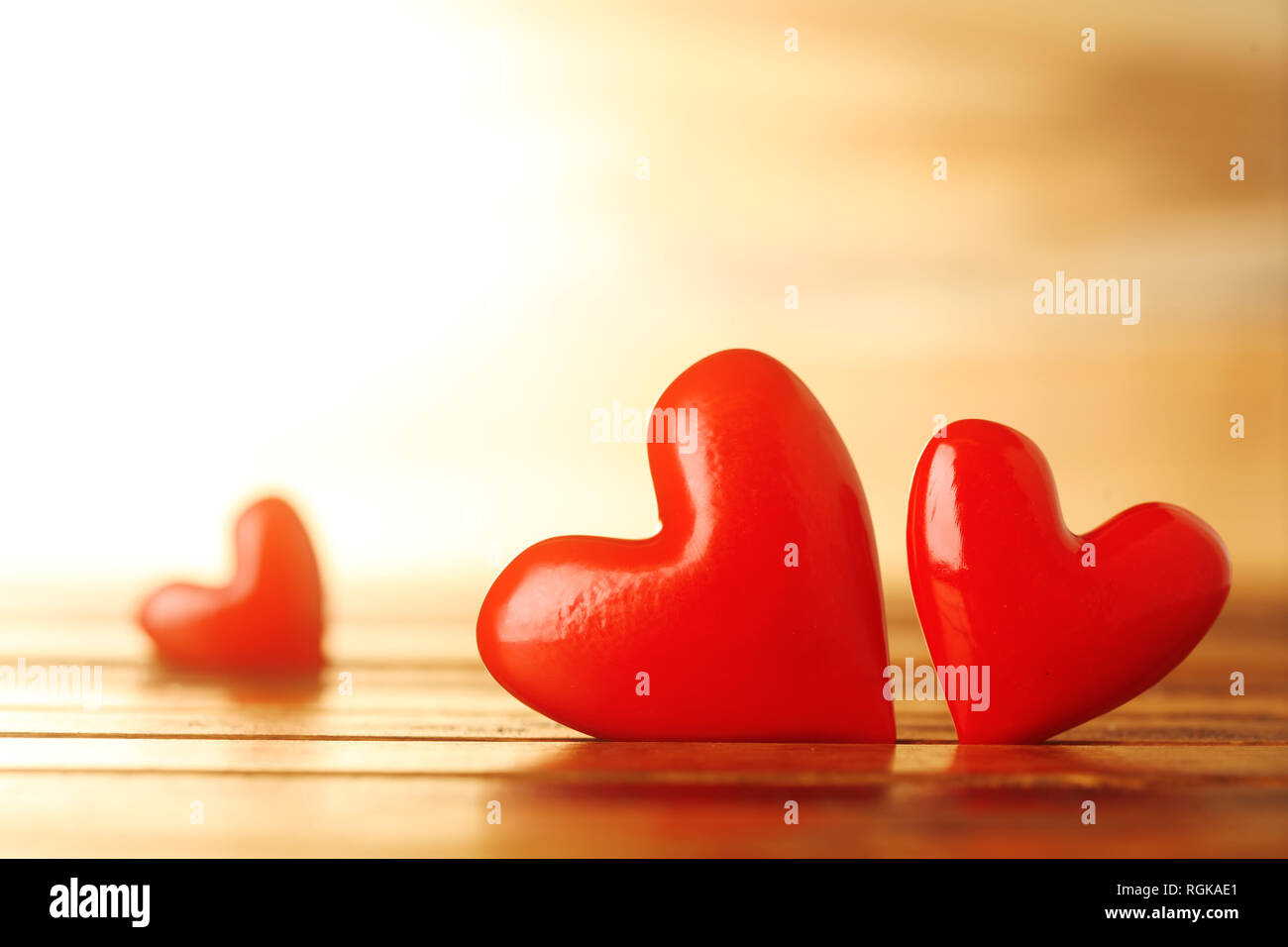 Shiny red hearts Stock Photo - Alamy