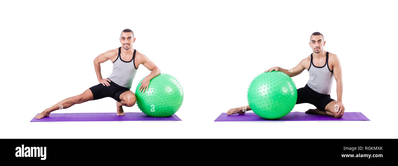 Man with swiss ball doing exercises on white Stock Photo - Alamy