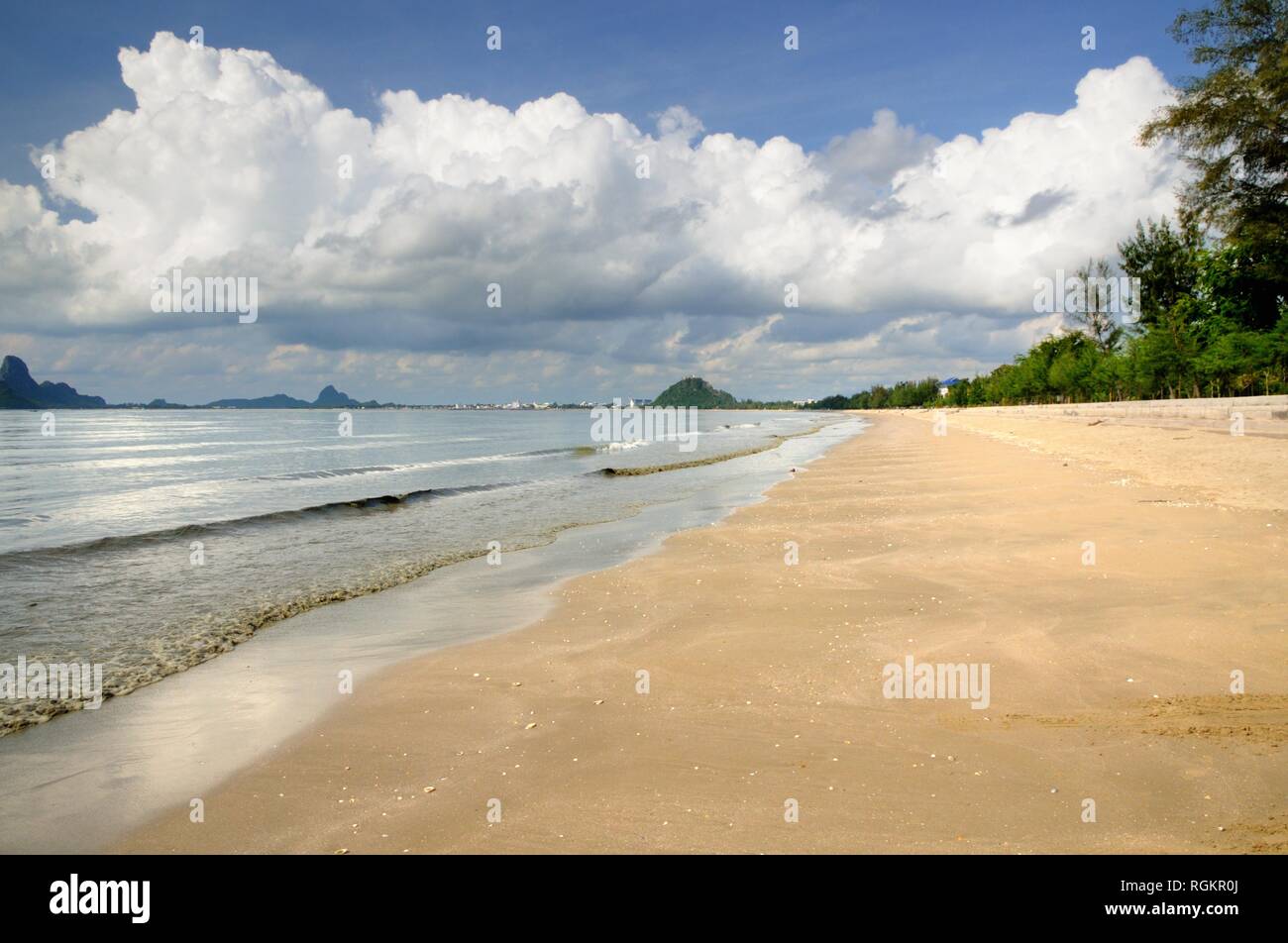 Sandy beach on the coast of the Prachuap bay in Prachuap Khiri Khan province of Thailand Stock Photo