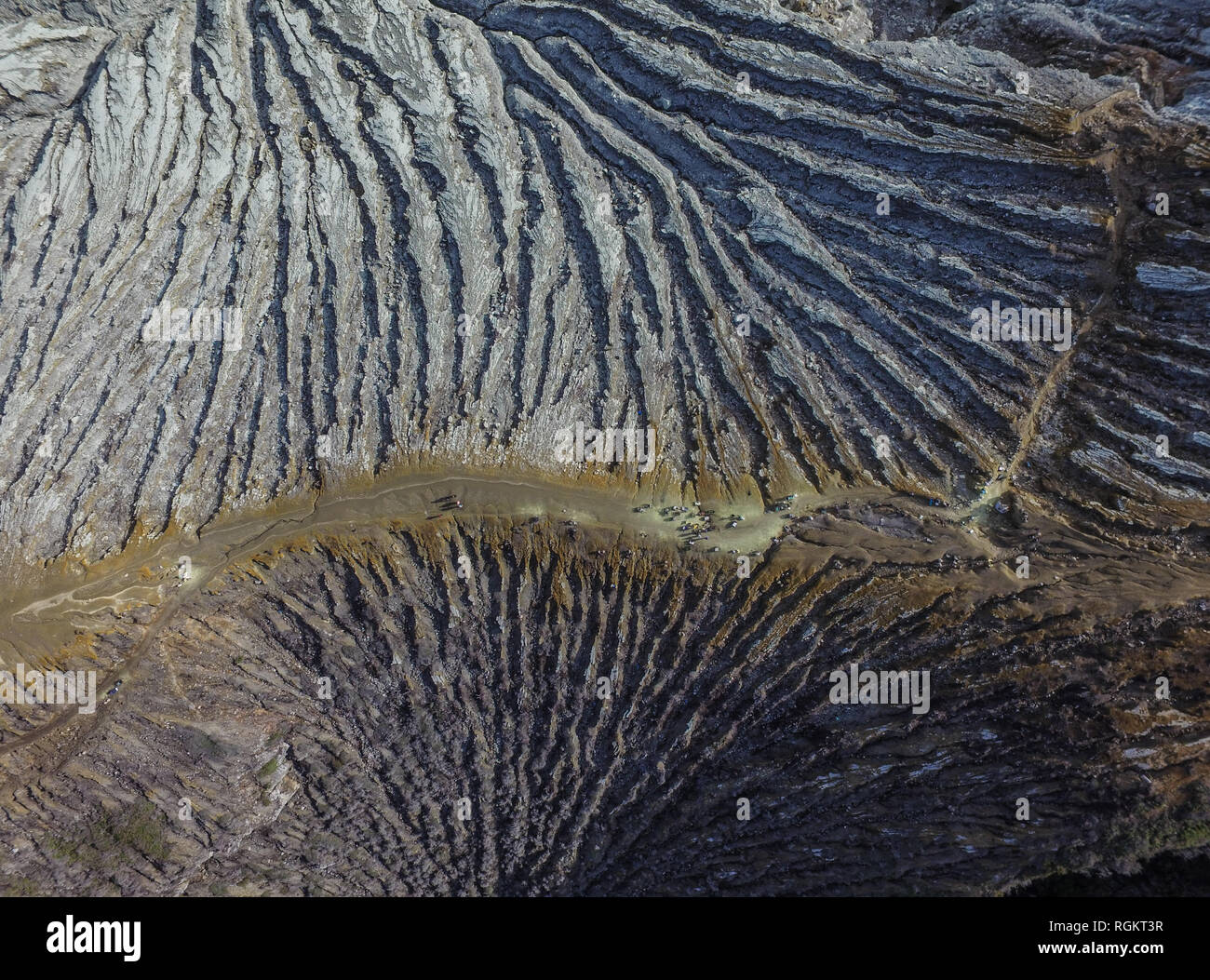 The unique pattern on the top of Ijen volcano. The pattern formed by rain water erosion on the side of Kawah Ijen. Stock Photo