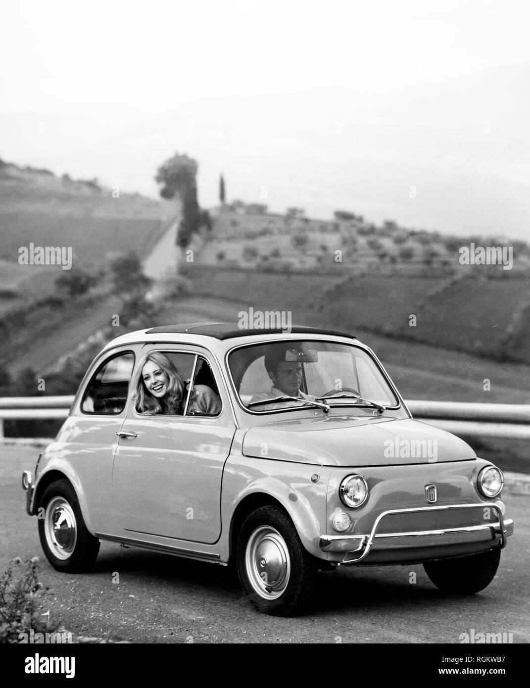 Two men driving one car Black and White Stock Photos & Images Alamy