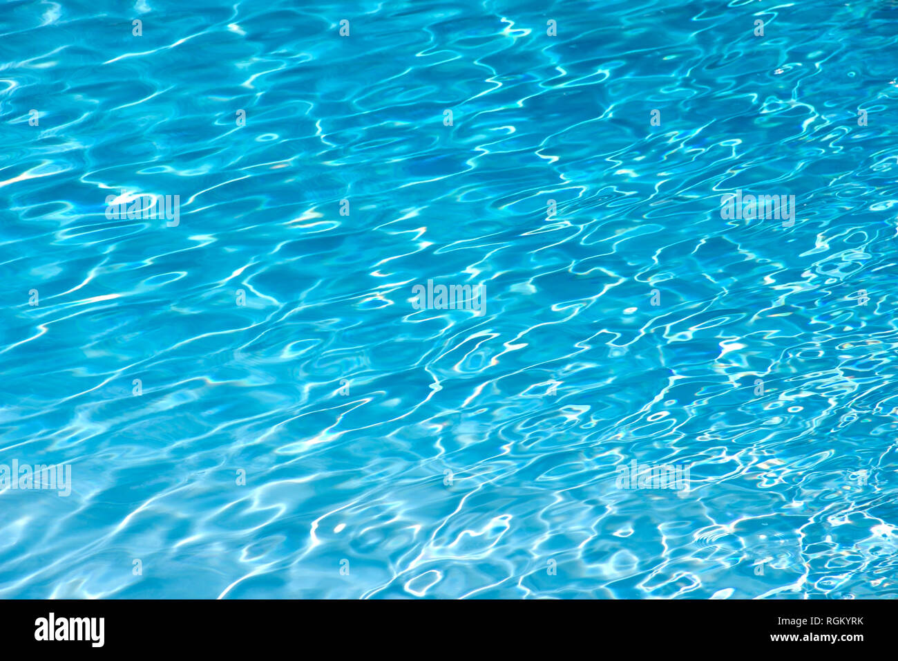 The blue water in the pool with the reflexions Stock Photo