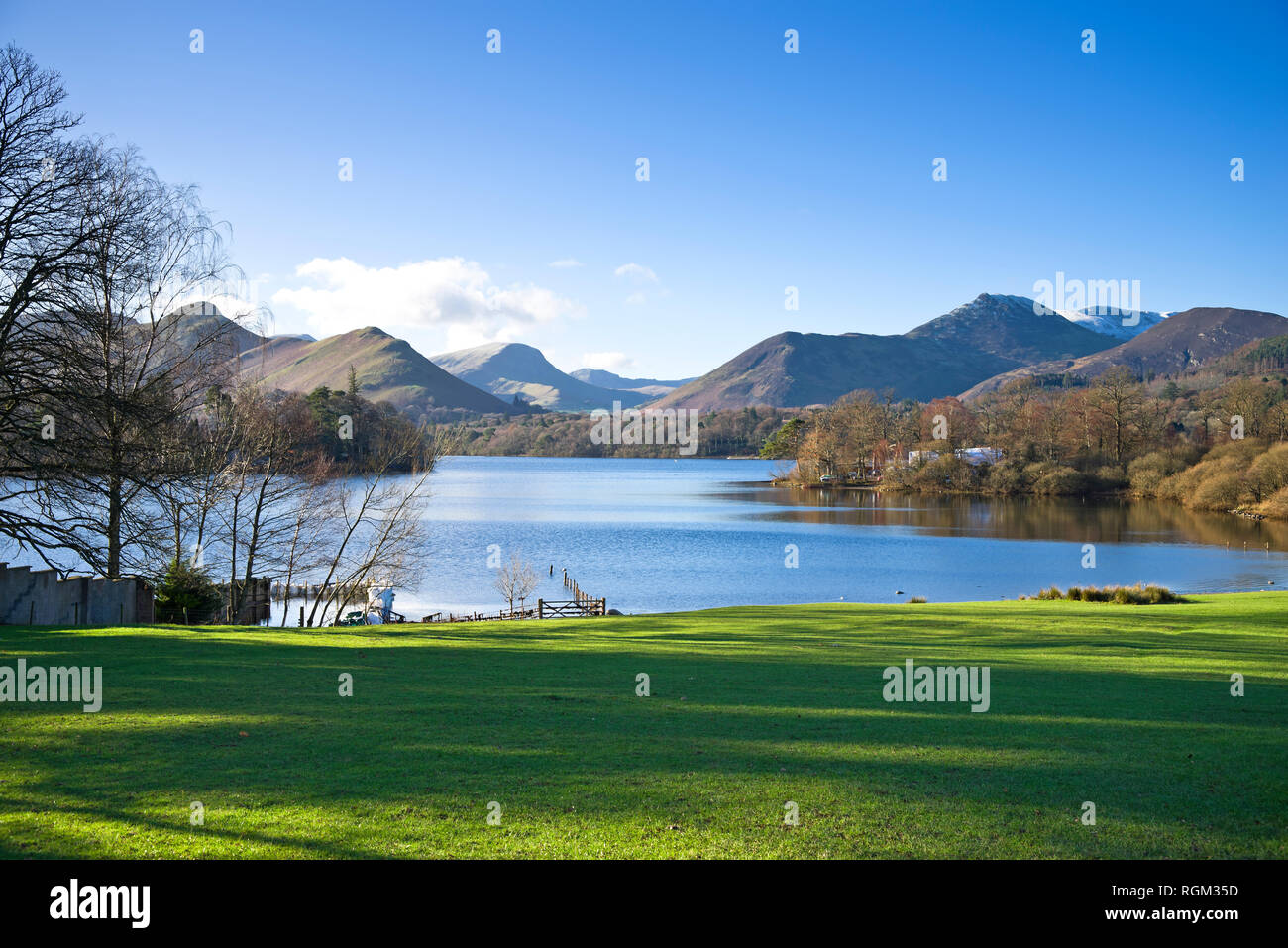 Derwentwater and the Western Fells seen from Keswick on a sunny winter day, clear blue sky, Lake District, Cumbria, England UK. Stock Photo