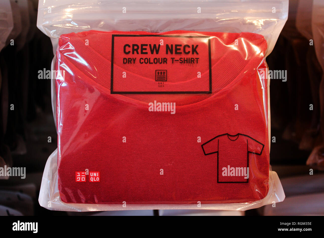 Uniqlo red T-shirt displayed packed in plastic bag, close-up Stock Photo -  Alamy
