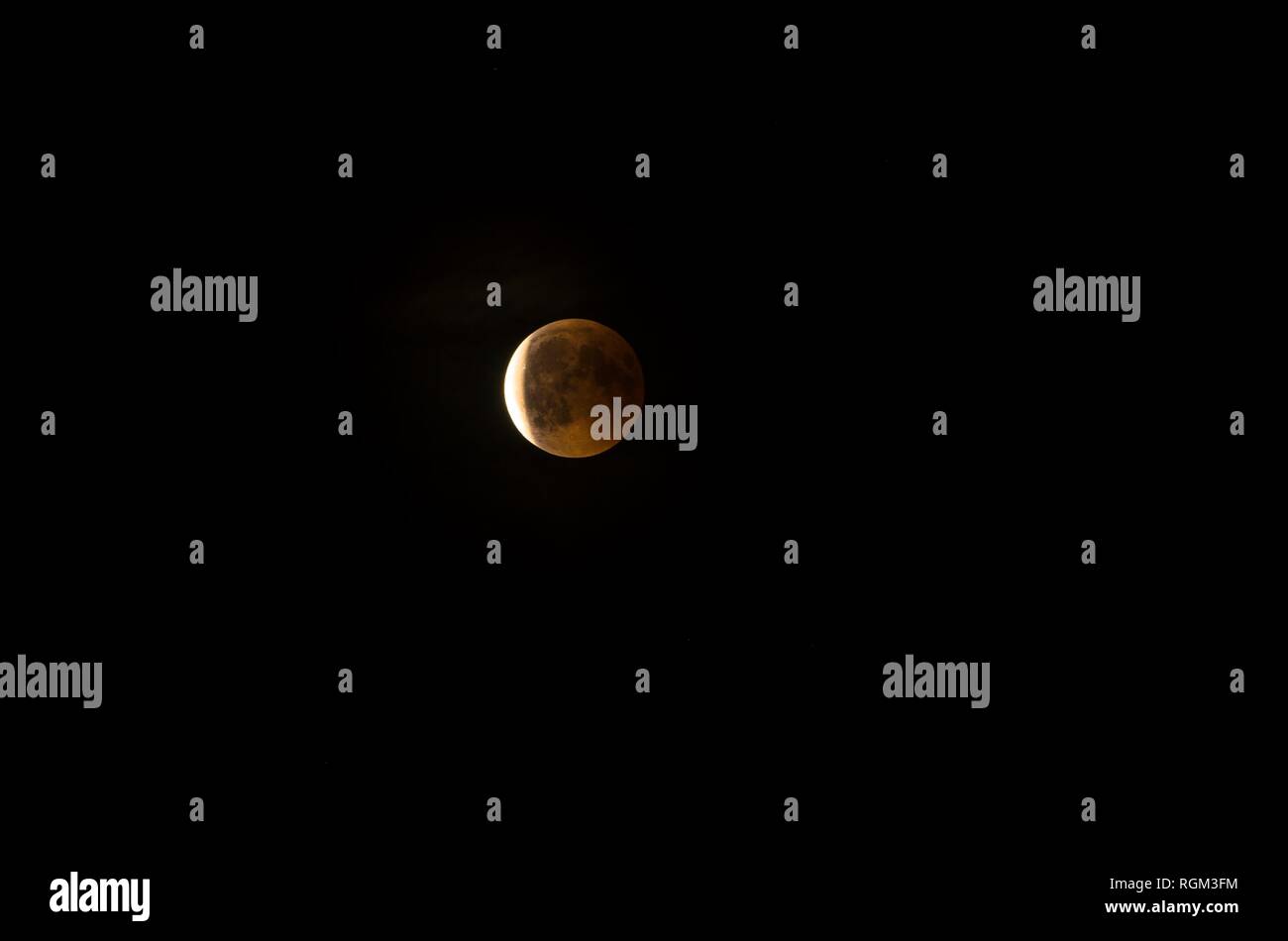 Red moon during an eclipse phase Stock Photo