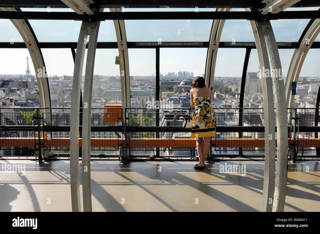 Tourist Enjoying a Panoramic View over the Paris Skyline from Centre Georges Pompidou or Beaubourg Modern Art Museum Paris France Stock Photo