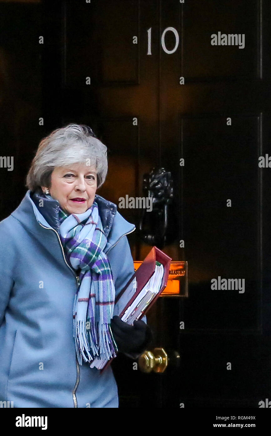Prime Minister Theresa May is seen departing from Number 10 Downing Street to attend Prime Minister's Questions (PMQs) in the House of Commons. Stock Photo